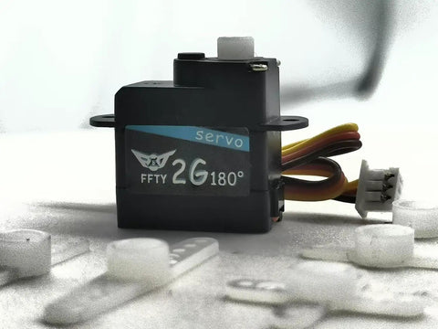 Close-up of Two Pack 2G Plastic Gear Mini Servo with JST Connector for RC hobbies, featuring wiring and servo components.