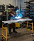 Welder using Heavy Duty Folding Welding Table And Adjustable Workbench, Built Tough 1800 Lbs Workhorse Galvanized Steel Platform.