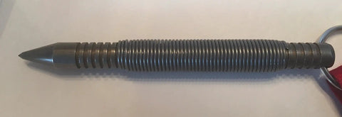 Heavy Duty Hammerless Window Punch For Fire Rescue And Emergency Response With Attachment Lanyard delivers a close-up view of the compact steel tool.