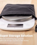 Ultra Precise Digital Kitchen Scale With LCD Display Weighs Grams Ounces Pounds Fluid Ounces And Milliliters in a storage bag