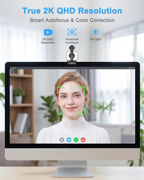 Pro Grade 2K Webcam For Pcs Featuring Warm Led Ring And Punchy Dual Mic Plus Handy Privacy Slider For Daily Work From Home Hustle And Butter Smooth Calls With Zero Hassle Setup Every Single Time You Log On on a desktop monitor with autofocus in a well-lit environment.