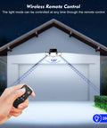 Solar Motion Sensor Flood Light With 210 LEDs Delivers 2500 Lumens Of Dope Outdoor Lighting mounted on a garage with remote control