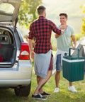 Two men outdoors sharing a Tailgate Ready Portable Thermoelectric Car Cooler And Warmer 26 5 Quart Dual Temp Fridge for Truck RV.
