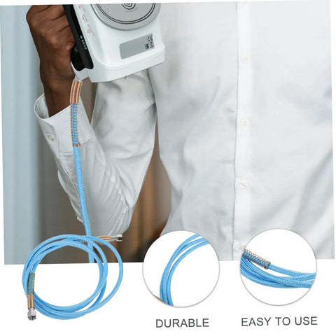 Person holding iron with High Pressure Steam Hose Tube For Professional Steam Irons in sky-blue color, durable and easy to install.