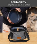 Camping Cookware Set In 304 Stainless Steel With Pots Pan Kettle Colander And Tote shown stacked for portability.