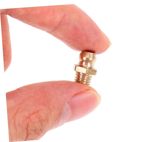 Close-up of a brass grease fitting held between fingers from Grease Zerk Fitting Assortment Kit With Angled Nozzles SAE Brass Angled Grease Tips For Auto And Industrial Use 25 Piece Multi Use Gun Accessory Set For Professionals