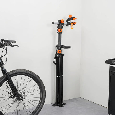Heavy Duty Bike Repair Stand With Four Leg Base Adjustable 42.5 To 74.8 Inch Height Foldable Maintenance Stand in garage setup.