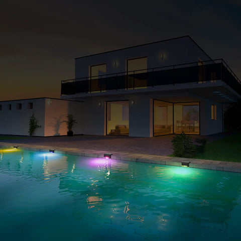Solar Pool Side Lights 4 Pack Color Changing Waterproof LED Deck Lights For Stairs Fence Yard Patio Pathway Night Illumination Easy Install Outdoor Decor Glow Up Your Outdoors illuminating a poolside at night