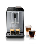 Fully Automatic Espresso Machine With Milk Frother System And Touch Control Panel Plus Cup Warmer For One Touch Latte And Cappuccino Maker In Sleek Dark Silver, featuring brewed espresso and cappuccino.