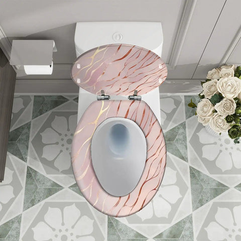 Elongated Rose Gold Marble Resin Toilet Seat for Bathroom atop a white toilet showing floral tile flooring and installation details.