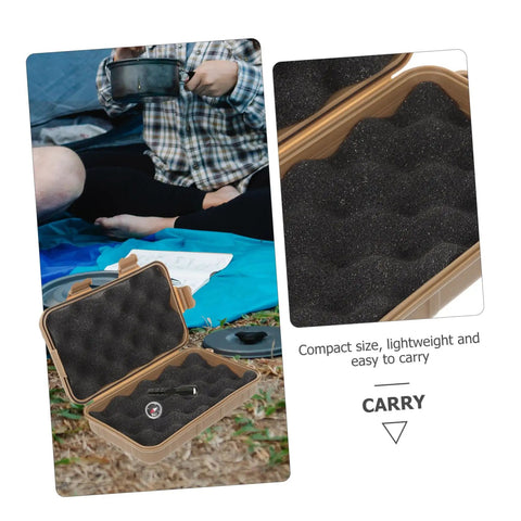Rugged Survival Storage Box With Shockproof Organizer for outdoor tools on grass, open with black foam interior and compass inside.