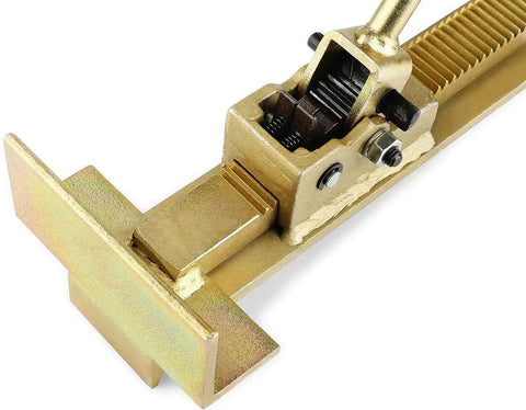 Close-up of beefy steel Flooring Installation Jack for hardwood and laminate, showing ratcheting mechanism and plank alignment use.