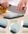 Dual Sided 400/1000 Grit Knife Sharpening Stone With Non Slip Rubber Base, silicon carbide block shown being used by hand