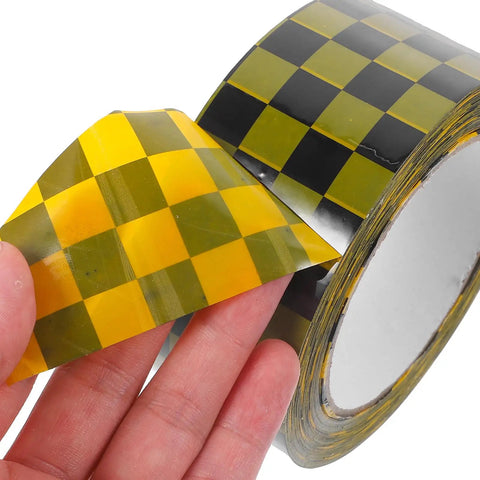 Plaid Pattern Shipping Tape 2 Rolls Adhesive Sealing Packing Tape With Black Yellow Grid Design, hand holding tape edge.