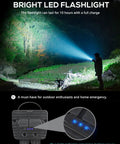 Person using Portable Gym Lighting For Posing And On The Go Magnetic Foldable LED Work Light in forest with blue beam.