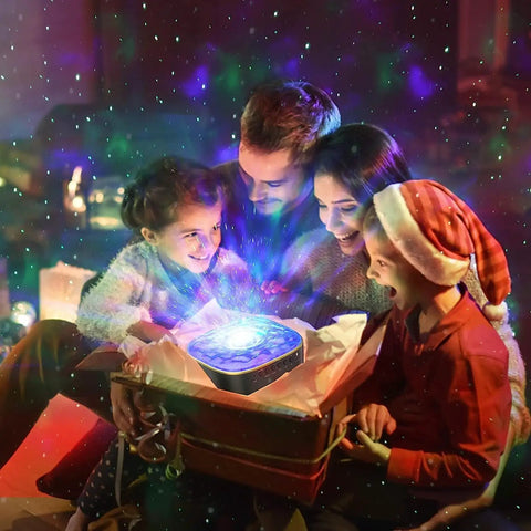 Family enjoying Lit Star Projector Galaxy Night Light With Remote And Timer For Bedroom Gaming Room Home Party Ocean Wave Projection