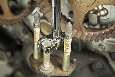 10 Piece 3/8 Inch Drive Flare Nut SAE Wrench Set Built Tough for Softer Nuts in use on mechanical gear, hex head design visible