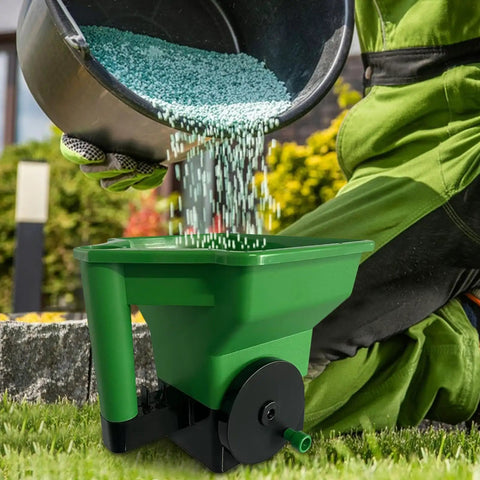 Hand Crank Garden Spreader For Lawn Care No Power Needed Seed And Fertilizer Applicator Portable Handheld Tool Built From Crack Resistant ABS And PP Easy To Use For Planting Seeding And Lawn Maintenance, green ABS hopper filled with pellets