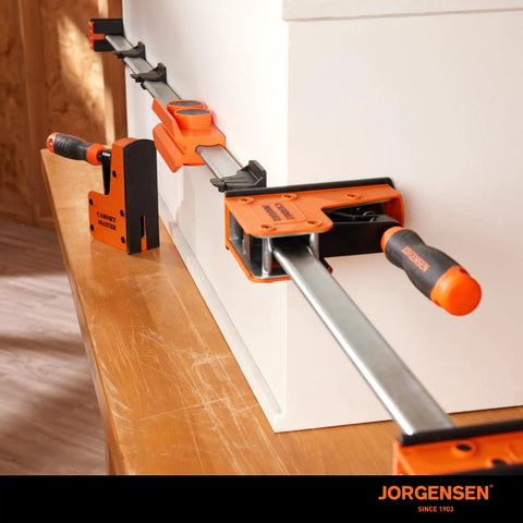 Parallel Clamp Extender For Cabinet Master Clamps, Beefy Aluminum Connector, 2200 Lb Capacity in use on a cabinet corner