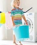 Child holding a blue laundry basket with 32 Pack Self Adhesive Mini Caster Wheels with 360 Degree Swivel, ABS and Stainless Steel Build attached.