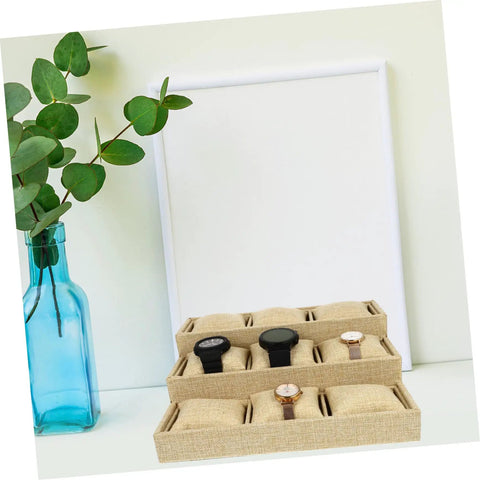 Top Linen Watch Tray With 9 Grids For Jewelry And Watch Storage displaying three watches in a khaki linen valet dish.