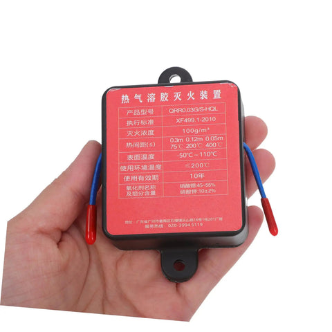 No Sweat Auto Rescue 30G Fire Extinguisher With Super Sticky Back Adhesive For Sedans Trucks And Trailers self-activating unit in hand.