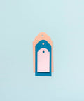 Stacked tags created using 3-In-1 Round Tag Punch For Crafting And Scrapbooking, Multi Color Tool That Lets You Create Gift Tags.