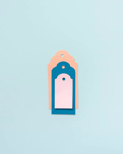 Stacked tags created using 3-In-1 Round Tag Punch For Crafting And Scrapbooking, Multi Color Tool That Lets You Create Gift Tags.