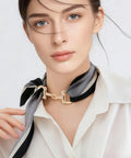 Gold Mini Horse Bit Charms Set Of 6 used as a scarf tie on a white shirt