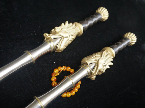 Handmade Chinese Kung Fu Sword Pair With Stainless Steel Blade And Brass Fittings 33 Inch Overall 25 Inch Blade Wood Handle No Scabbard Brand New Dope Collectible Martial Arts Weapon For Training Display Or Gift, close-up of brass dragon fittings on handles.