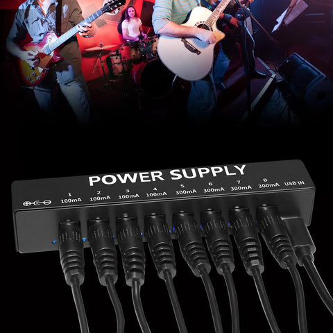 Eight Isolated Outputs Pedalboard Power Supply With Independent Short Circuit Protection, shown with connected cables.