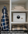 Small 1.2 cu ft safe box with digital keypad and 2 bolt anti-theft locks, installed in closet next to folded clothes and shirts