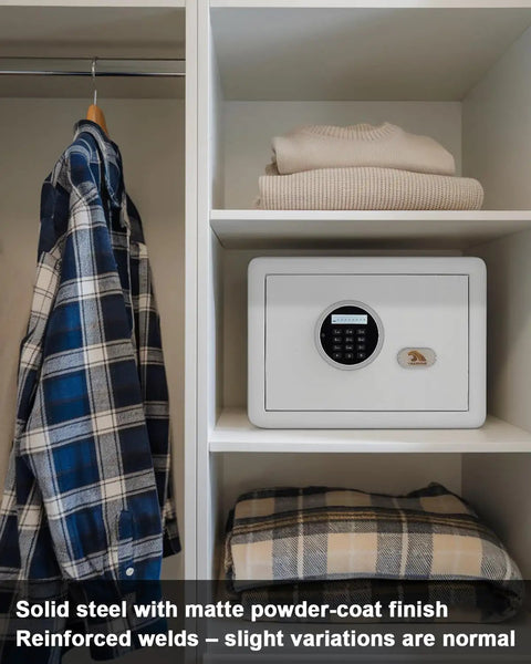 Small 1.2 cu ft safe box with digital keypad and 2 bolt anti-theft locks, installed in closet next to folded clothes and shirts