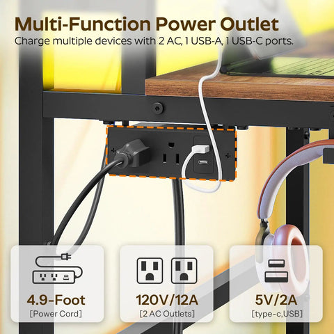 Multi-function power outlet on a small computer desk with charging station and LED lights, showing AC and USB ports, rustic brown finish