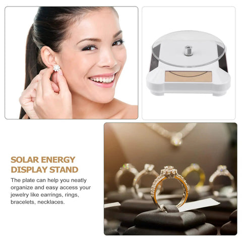 Ipetboom Battery Free Rotating Display Stand Electric Jewelry Showcase Solar Powered Turntable showing earrings and rings.
