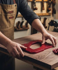 Professional Grade Built Tough Router Corner Template Jig With Interchangeable Curvature Plates And Red Anodized Aluminum Frame in use on wood.