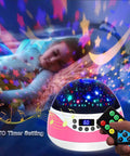 Kids Night Light Projector With Timer And Music, Starry Sky Projector For Bedroom showing a starry sky display and remote control