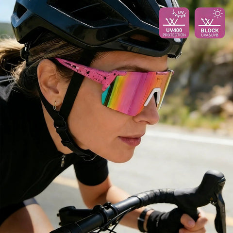 Cyclist wearing Polarized Sports Sunglasses With UV 400 Protection For Women And Men, Ultra Lightweight Frameless Running Glasses In Pink