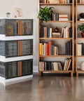 No Sweat Organizing With These Heavy Duty Plastic Storage Boxes With Lids, Built Tough 19 Gallon Collapsible Folding Bins For Closets And Garages Stackable Home Organization Crates 3 Pack in a living room.