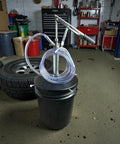 Lever Action 5 Gallon Pump For Oils And Lubricants, Self Priming, 1 Qt Per 12 Strokes, 5 Ft Hose, in garage setting