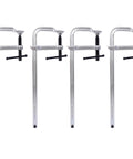 Four 12 inch bar clamps designed for use with the Rock Solid 55 Inch Rubber Wood Workbench For Garage And Workshop.