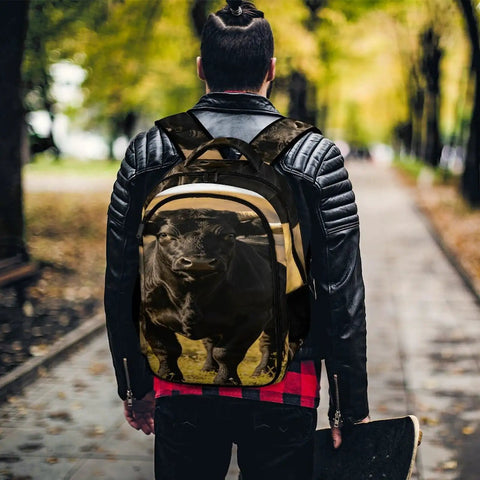 Person wearing Black Longhorn Bull Printed Unisex Backpack With Large Capacity, streetwear look on sidewalk with skateboard