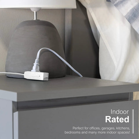 Heavy Duty Three Outlet Flat Extension Cord 3 Feet Long Grounded Power Cable With Secure Three Prong Plugs For Home Office Setup and Sleek Under Desk Layout near a lamp on a nightstand.