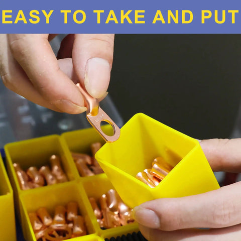 Person holding Heavy Duty Copper Battery Cable Ends Kit lug near yellow container, showing ring terminal connectors.