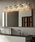 Modern Five Light Vanity Light in Chrome with clear K9 crystal shades for bathroom wall fixtures, mounted above a mirror