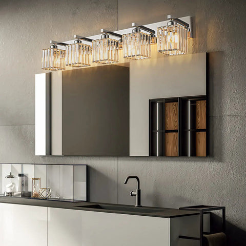 Modern Five Light Vanity Light in Chrome with clear K9 crystal shades for bathroom wall fixtures, mounted above a mirror
