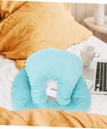 Office Desk Nap Pillow Ergonomic Face Down Rest Cushion Plush Lightweight Portable Sleep Pillow on bed next to laptop