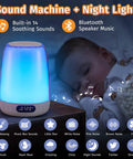 Smart App Controlled Night Light With Built In Sound Machine For Baby Nursery glowing blue near sleeping child.