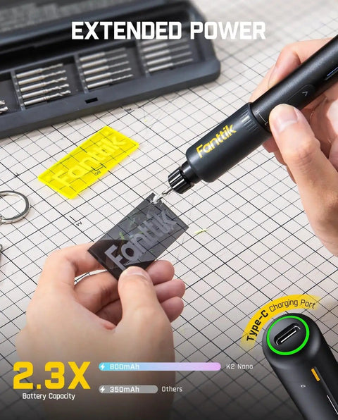 K2 Nano Power Drill Kit for DIY Projects With 20 Bits and 800mAh Rechargeable Battery in use on grid paper with Type-C port