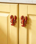 Lobster Shaped Cabinet Knobs Set of 2 Hand Painted Metal Drawer Pulls With Mounting Screws Ocean Inspired Coastal Decor on yellow cabinets